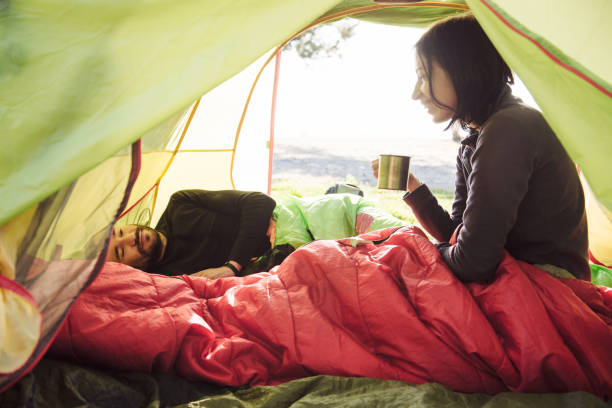 Lightweight backpacking sleeping bag inside a camping tent.